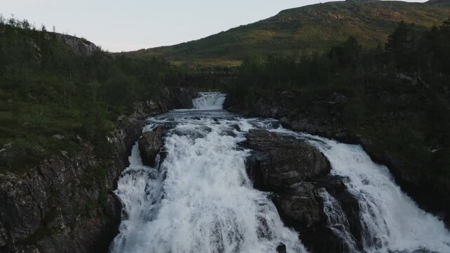 V&oslash;ringsfossen waterfall in Norway in summer evening