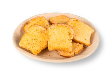 Fototapeta premium Plate of golden brown crispy garlic bread toasts seasoned with herbs. Delicious appetizer or snack isolated on white background, perfect for food menus and bakery marketing.