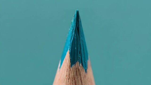 ティール色の色鉛筆を同系の背景グラデとともに描写