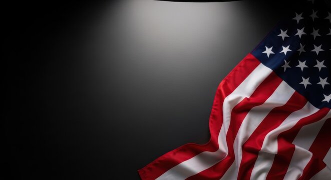 Waving american flag on black background, patriotic and solemn mood