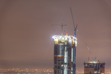 Fototapeta premium City twilight Amazing cityscape light. Panorama view of Bangkok city skyline night time sunset sky. Beautiful skyscraper midtown landscape. Capital building background modern office district