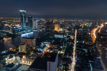 City twilight Amazing cityscape light. Panorama view of Bangkok city skyline night time sunset sky. Beautiful skyscraper midtown landscape. Capital building background modern office district
