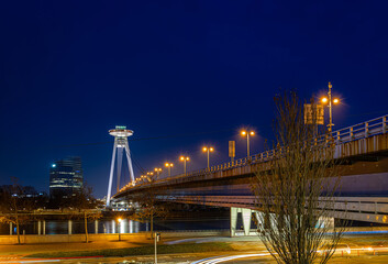 Fototapeta premium UFO Bridge Bratislava at night with illuminated tower and blue hour view