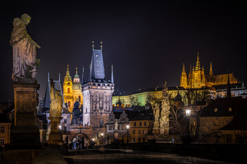 Fototapeta premium St Nicholas Church Mala Strana with Prague Castle at night, Czech Republic