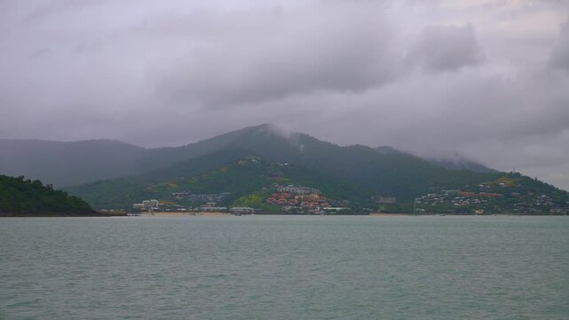 Port of Airlie beach Coral Sea Marina Great Barrier Reef Whitsunday islands boat ride cruise Australia Queensland Hamilton Island Heart of the Reef coastline cloudy afternoon tourist Pacific Ocean AUS