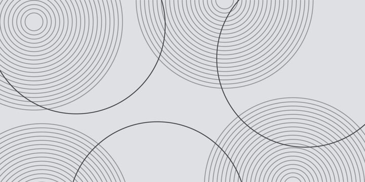 Minimalist gray background with subtle circular patterns. The gray background features smooth textures and repeating gray concentric circles. Circle pattern background vector. Light background.