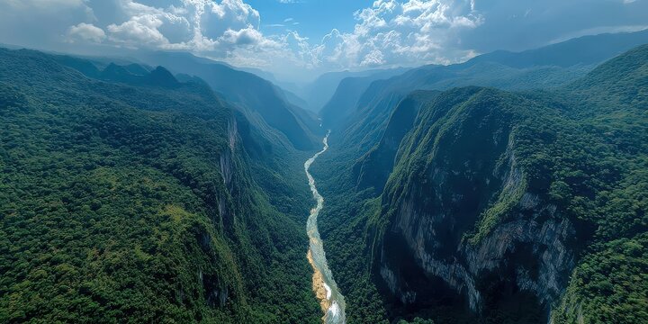 Verdant canyon landscape with winding river below