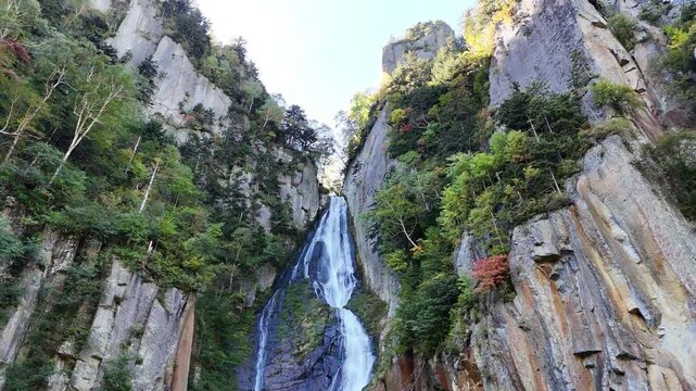 Ginga Waterfall | Low Angle | Blue Sky | Cliff | Early Autumn | Hokkaido
