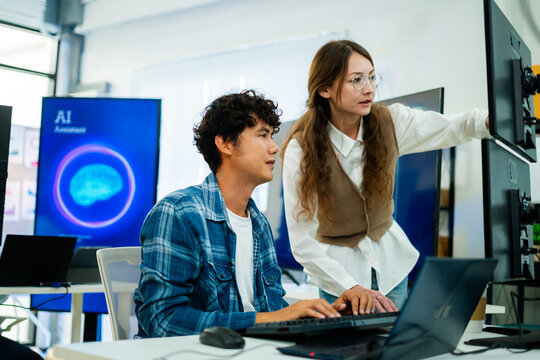 Young male,Adult female freelance typing write prompt AI bot IT app smart program,develop agentic ai,terminal with coding language,ux ui interface,designer,big data server center,quantum computer.