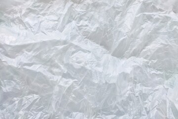 Obraz premium Crumpled White Plastic Film Texture Background for Eco and Packaging Design