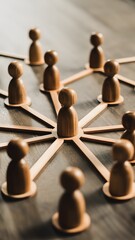 Obraz premium Wooden Figures Connected With Lines Representing Teamwork Leadership And Social Network Concept