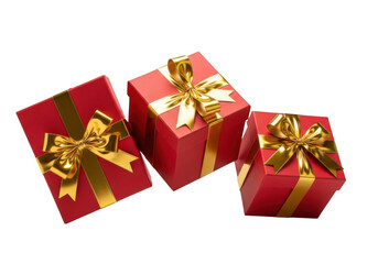 Fototapeta premium Three Red Gift Boxes with Gold Ribbon Bows on Transparent Background