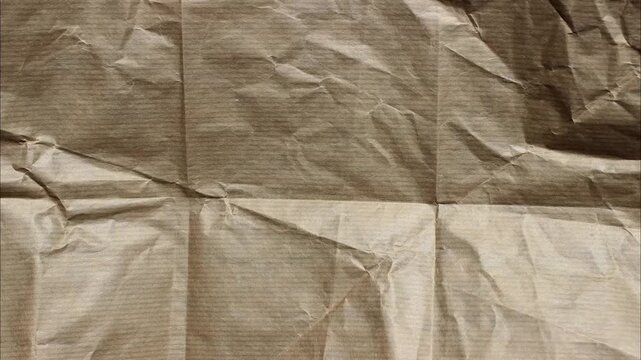 Textured brown paper with horizontal lines and creases background abstract natural material surface