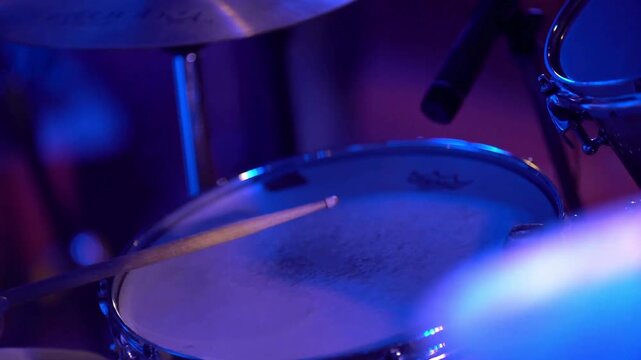 Repetition of rock or metal music band Night show in a musical instrument recording studio Close-up of drummer hitting hi-hat cymbals Rock hobby
