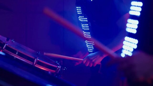 during live show Faceless drummer beats cymbal with his sticks in sound studio Drummer on stage instrument musician making hits new song background