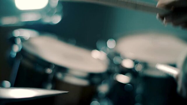 drums and cymbals Close-up of a drummer behind a drum kit Unrecognizable man plays with drumsticks in nightclub A man playing drums at a classical