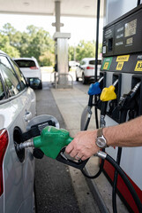 Fuel Pump Nozzle at Gas Station