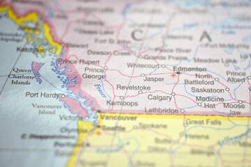 Naklejka premium Revelstoke British Columbia Canada Close Up Macro World Map Bokeh Background Geographic Image