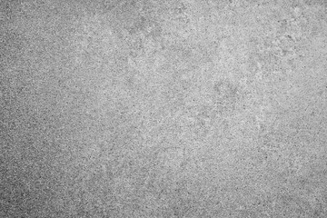 Obraz premium Close up view of distressed light gray concrete wall surface background with grainy textured details