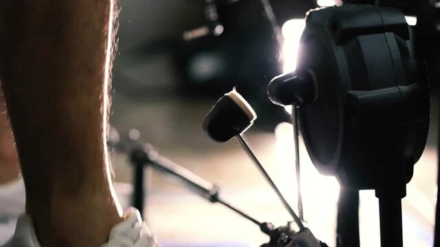 Close-up of drummer's feet pressing pedals of bass drum and hi-hat A professional musician plays with foot on drum pedal. Musician hobby background