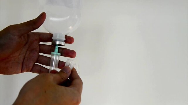 Hospital IV of Chemotherapy and Vital Fluids on Drip Intravenous saline solution cancer medical saline solution Clear tubing allows fluid flow freely