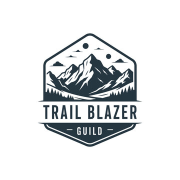 Trail Blazer Guild Logo - Majestic Mountain Landscape Emblem Design.