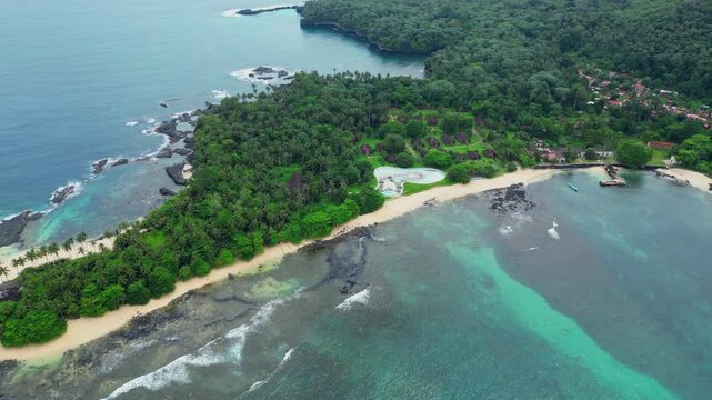 Flying over the islet of Rolas, centered on the Pestana resort, currently deserted after being abandoned during the Covid pandemic. S&atilde;o Tome,Africa.