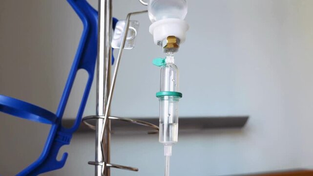 shallow depth focus of IV Fluids drop in medicine treatment in hospital with contains of NaCl. Sodium chlorine aka saline fluids for infusion