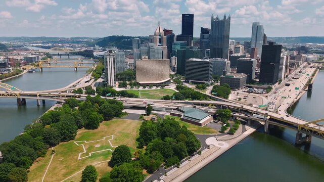 Drone footage capturing Pittsburgh downtown, bridges, and river confluence. Perfect for city, travel, and documentary projects.