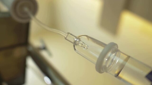 shallow depth focus of IV Fluids drop in medicine treatment in hospital with contains of NaCl. Sodium chlorine aka saline fluids for infusion