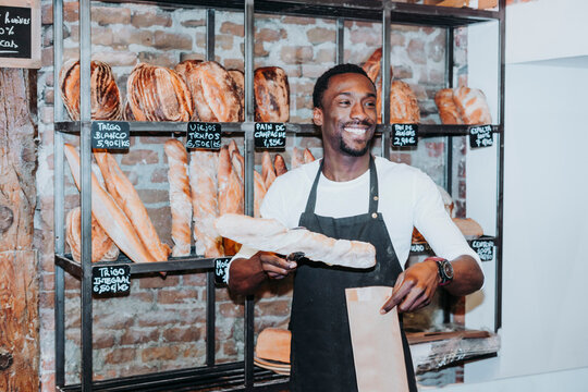Smiling man working in a bakery