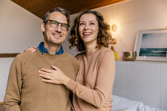 Happy affectionate couple at home