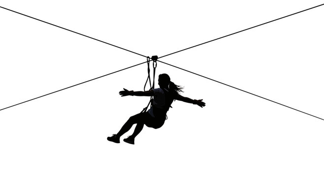 Person on zipline in air.
