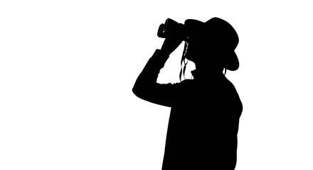 Silhouette of a person looking through binoculars.