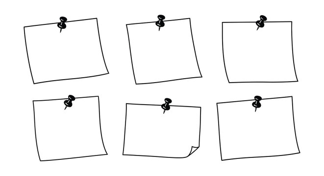 Collection of black and white note cards pinned to a surface