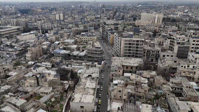 Cinematic drone shot of Aleppo's city center, capturing the vast architecture and daily life in the streets of this historic Syrian metropolis