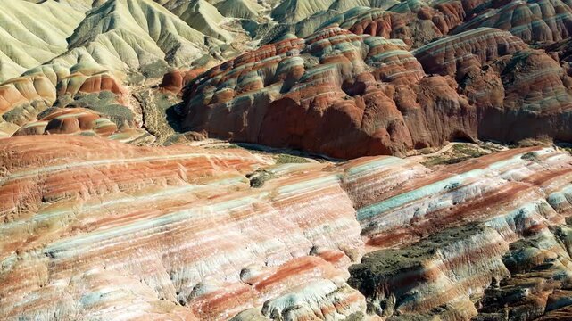 Aerial drone view of eroded sandstone ridges in Zhangye Danxia National Geopark, Gansu, China