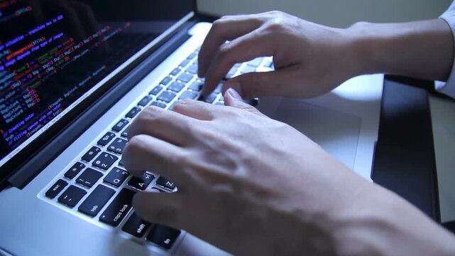 Close up woman coder programmer typing programming code on computer keyboard. developer programmer, developer. making writing code. Closeup coding