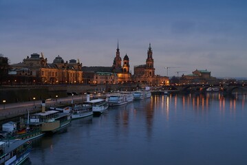 Dresden Frauenkirche skyline across Elbe River with illuminated historic old town