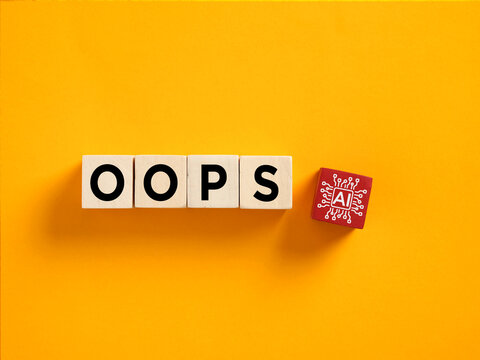 Wooden blocks spell OOPS with an AI chip block representing artificial intelligence hallucination, mistake, error, glitch, and failure.