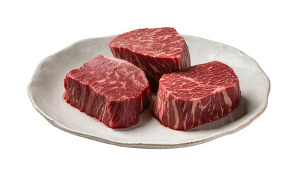 Fototapeta premium Isolated premium raw beef steaks on a rustic ceramic plate, fresh and ready for cooking.