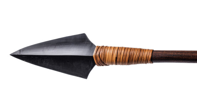 Isolated sharp primitive metal spearhead with a dark finish and a wrapped natural wood handle.