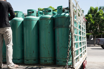 Naklejka premium Transportation of empty gas cylinders.