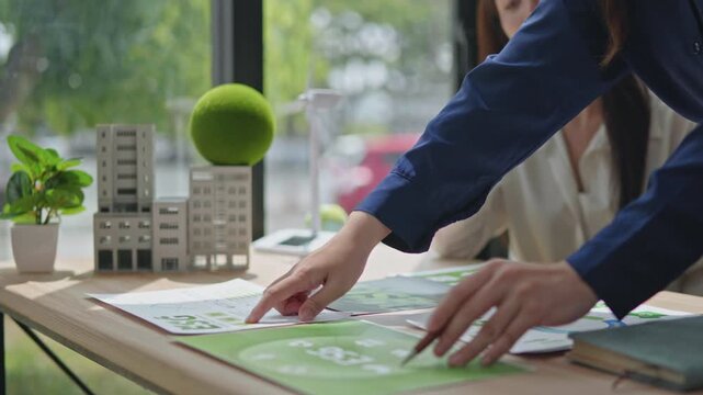 Sustainable strategy development office environment business meeting green initiatives close-up view esg concepts