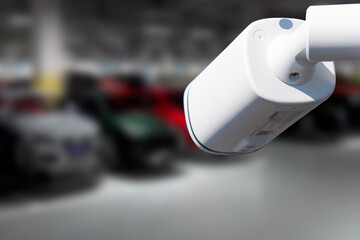 Security camera monitors parking lot to ensure safety and protect vehicles during daytime hours