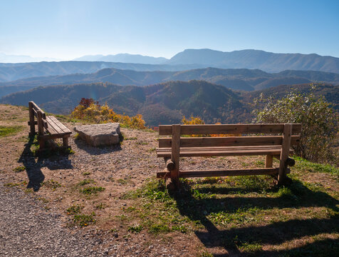 Observation deck with wooden benches in the mountains of Epirus in Greece