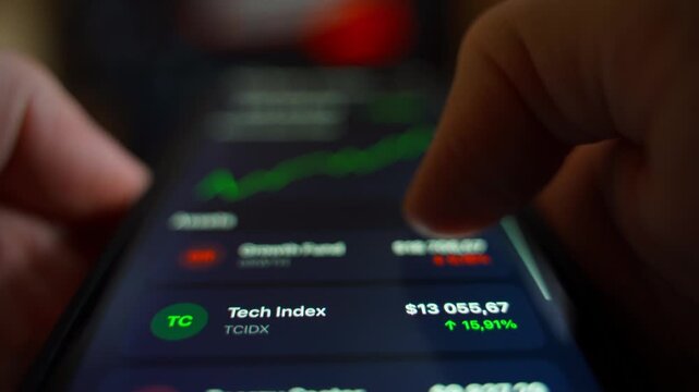 Scrolling investment mobile app close-up. Stock market fluctuations