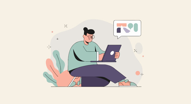 Person with glasses and bun working on laptop with abstract shapes in speech bubble