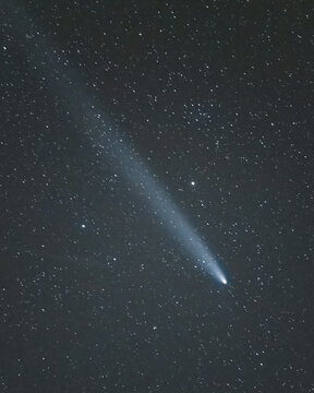 View of a celestial river of light streaks across the inky canvas of the night sky, dotted with countless stars, Auronzo di Cadore, Veneto, Italy.