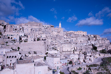 Fototapeta premium Carved into stone and shaped by centuries, Matera rises from the rocks of southern Italy like a timeless masterpiece.